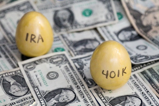 401k and IRA golden eggs on one dollar bills. Tax changes during retirement are important to consider and using a CPA is wise.