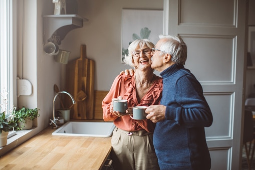 Senior couple for happy they considered retirement tax changes and used their CPA for guidance.