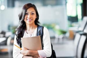 A portrait of a college student on campus.Education Tax Credits - Brown, Chism & Thompson