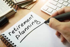 Retirement planning handwritten in a note.